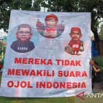 Ratusan Pengemudi Ojol Gelar Aksi di Monas, Tolak Potongan 10 Persen